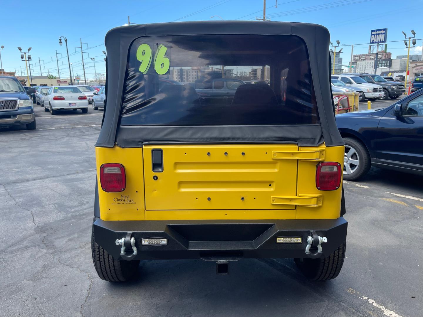 2000 Solar Yellow /Black Jeep Wrangler SE (1J4FA29P9YP) with an 2.5L 4 Cyl. engine, Manual transmission, located at 801 South State Street, Salt Lake City, UT, 84111, (801) 328-0098, 40.751953, -111.888206 - Wow extremely rare to find extra clean Jeep in immaculate condition 4x4! Low miles only 98,248 miles! Interior and exterior are both in excellent shape for the year. This is a clean title no reported accidents on the CarFax history report. It has passed emissions already and is ready to go. Featur - Photo#15